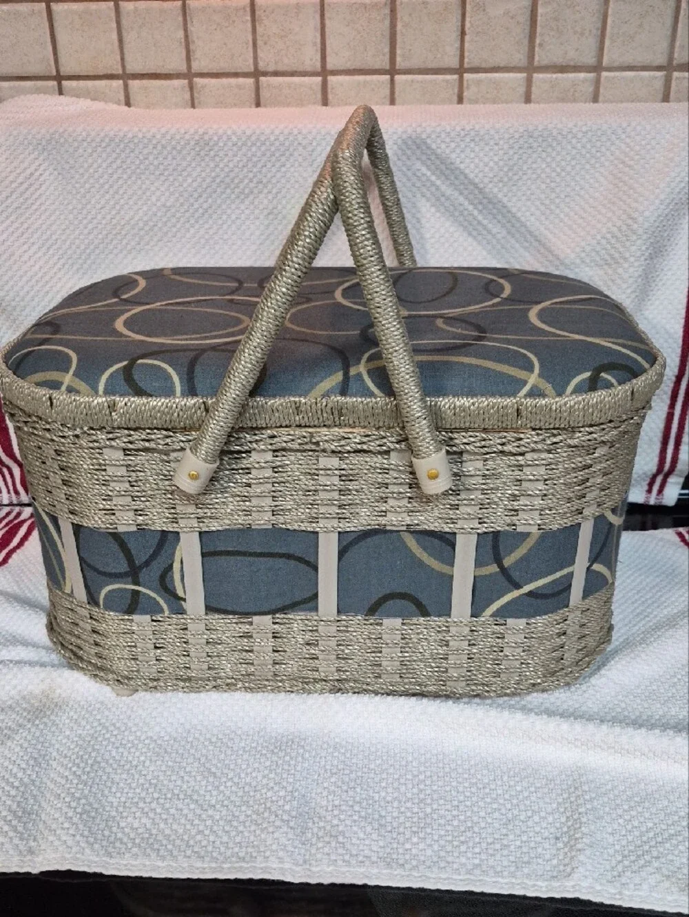 Woven Decorative Sewing Basket with Blue Pattern and Cream Trim Wooden Bottom